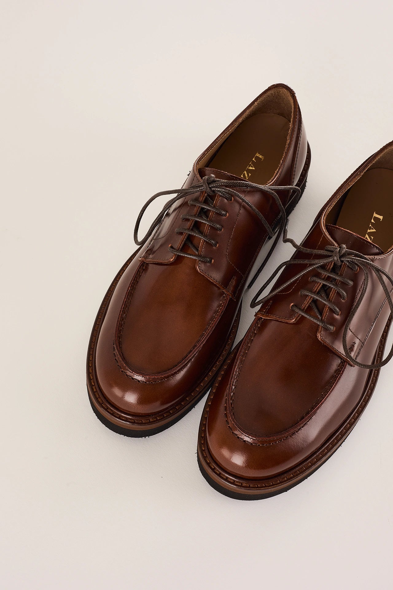 Scarpe stringate con suola alta in gomma