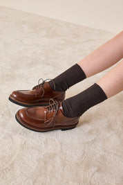 Scarpe stringate con suola alta in gomma