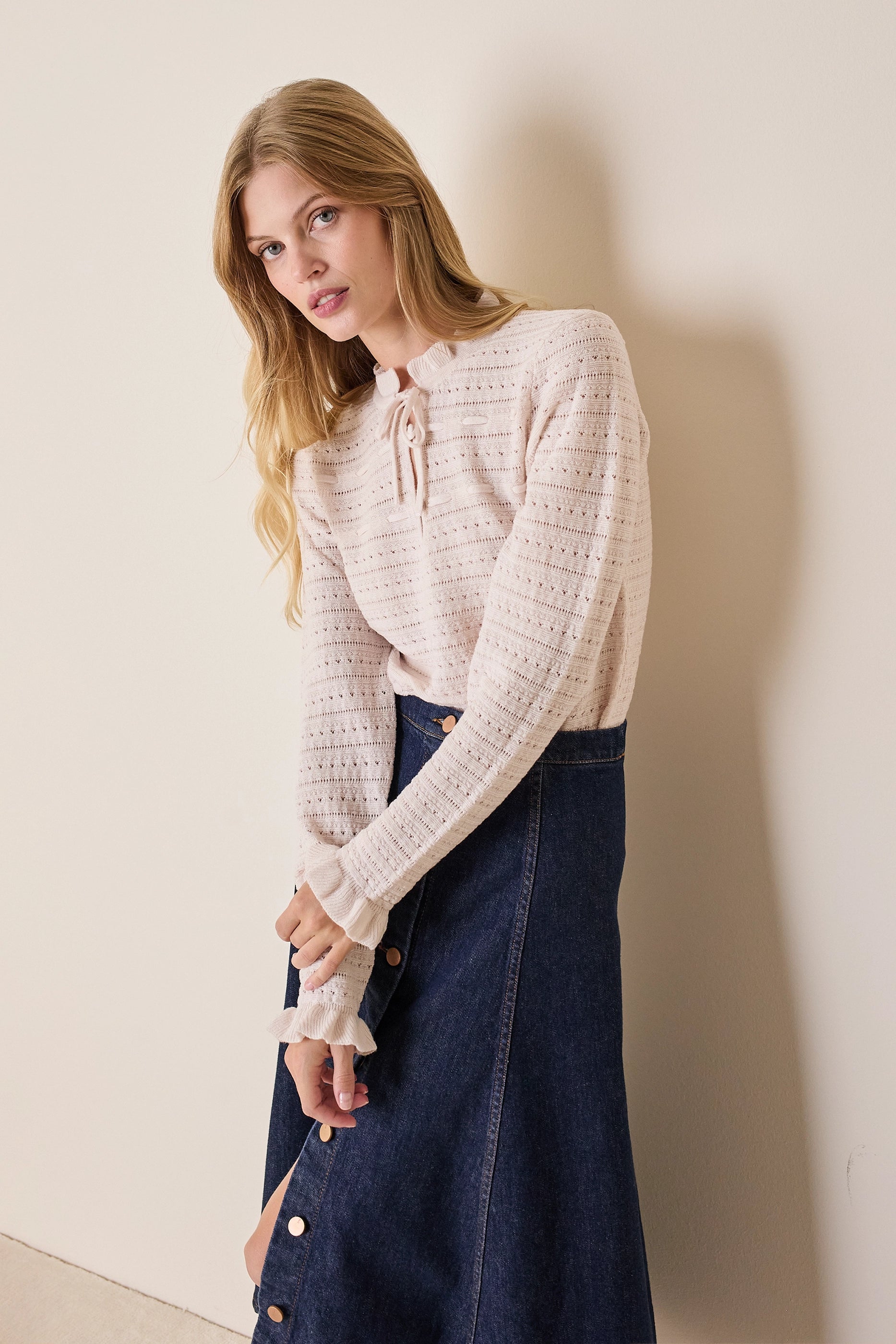 Openwork knitted top with tie ribbon