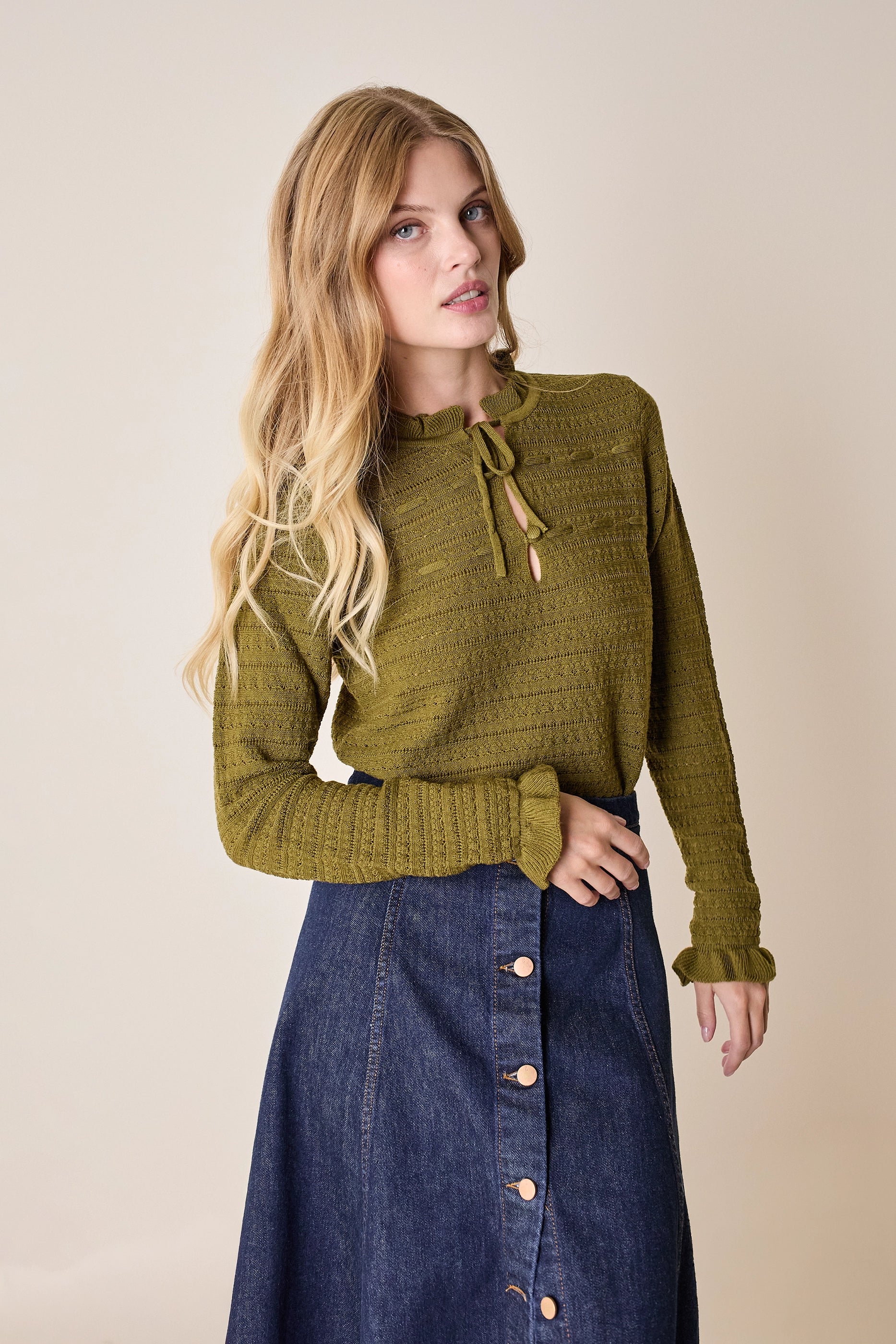 Openwork knitted top with tie ribbon