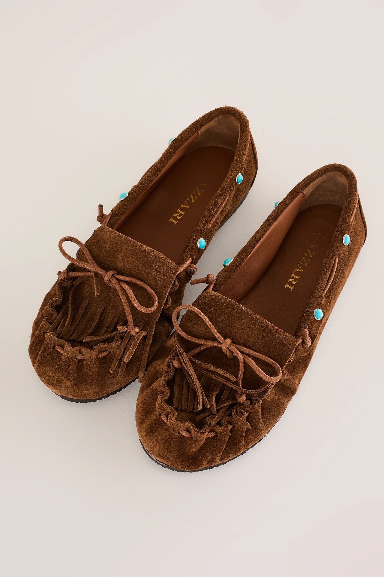 Suede fringe loafers