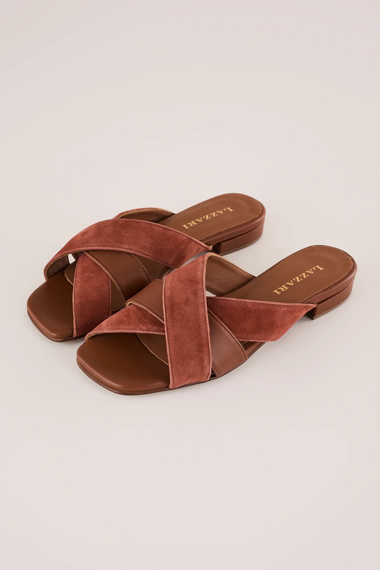 Woven leather slides