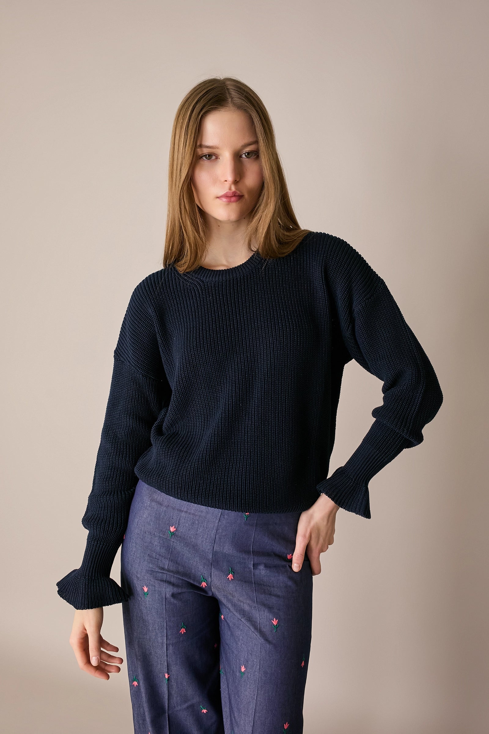 Maglia punto pannocchia con polsini volant