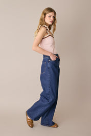 Knit top with ruffle straps