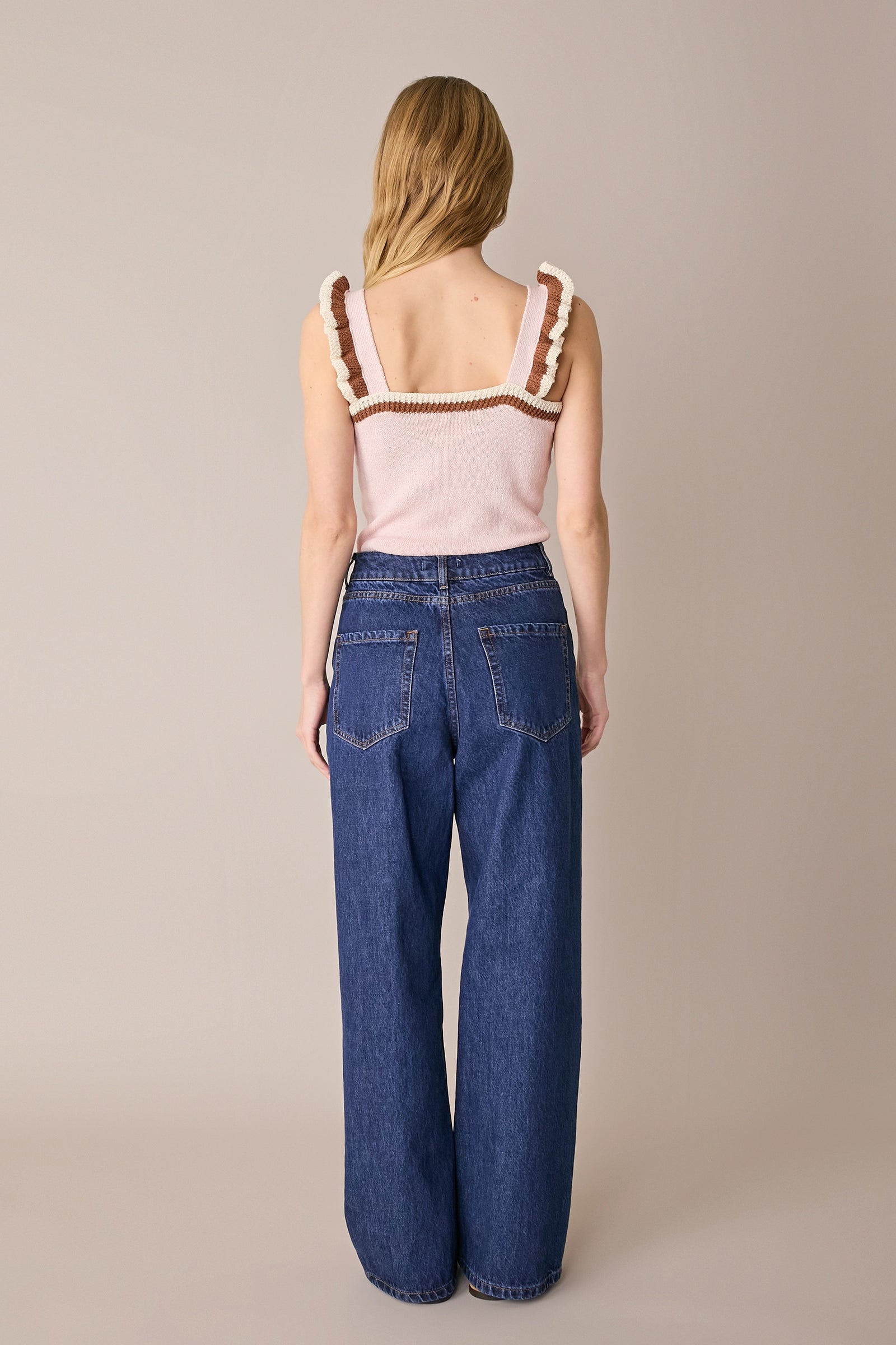 Knit top with ruffle straps